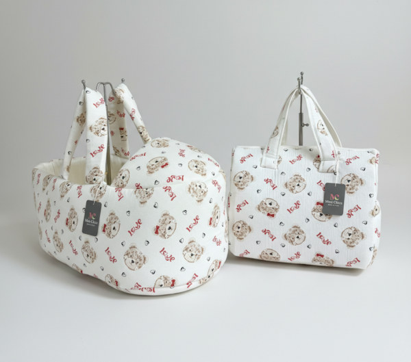 حمالة بيبي مع شنتة برسم دبدوب